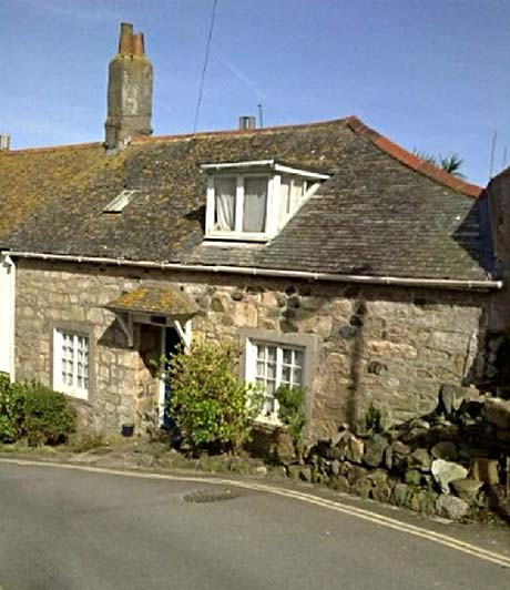 external shot of Skidden Cottage, a traditional granite cottage